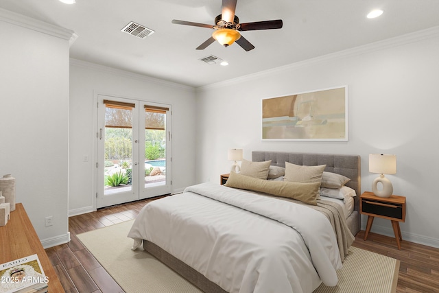 bedroom featuring french doors, access to exterior, crown molding, baseboards, and wood finished floors