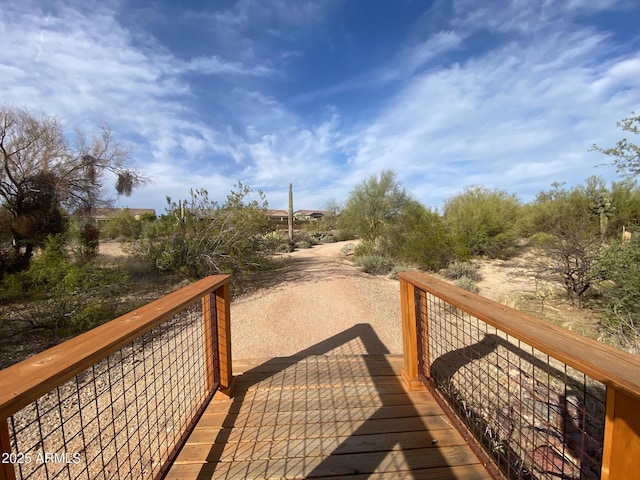 surrounding community with a wooden deck