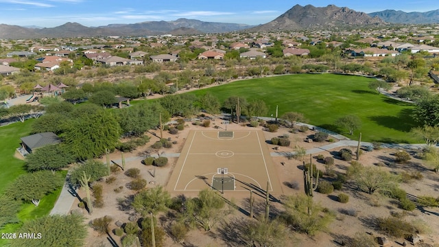 view of property location with nearby suburban area and a mountain backdrop