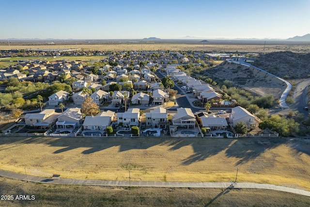 birds eye view of property featuring a mountain view