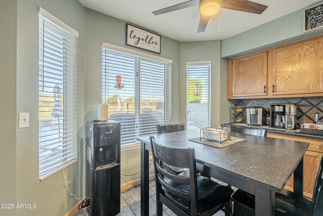 dining area featuring ceiling fan