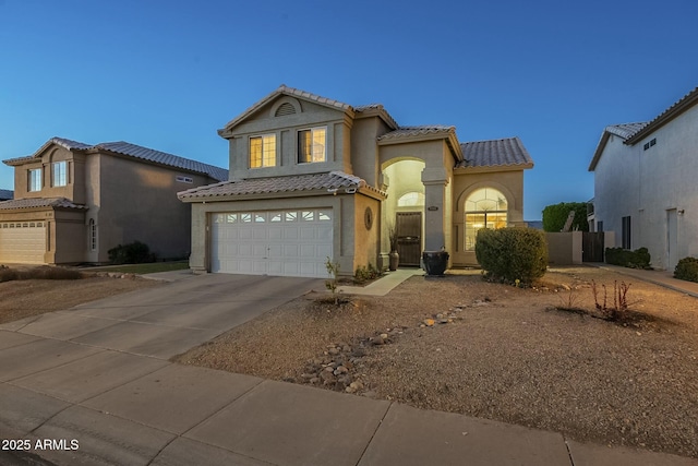 view of front of property with a garage