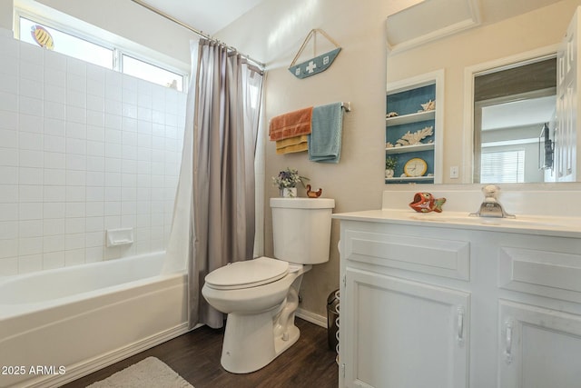 full bathroom featuring toilet, hardwood / wood-style floors, vanity, and shower / bath combo with shower curtain