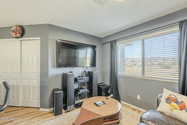 living room with light hardwood / wood-style floors