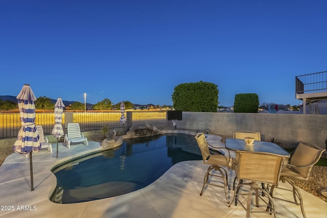 view of pool featuring a patio area