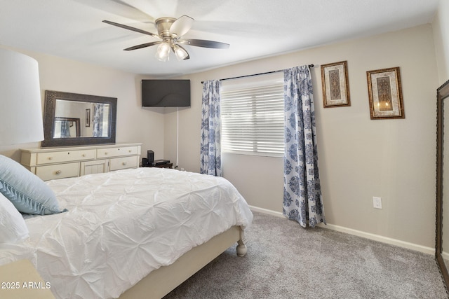 bedroom with ceiling fan and light colored carpet