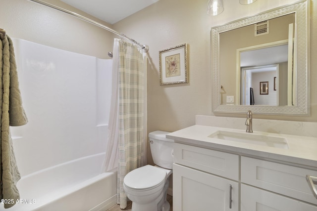 full bathroom with toilet, vanity, and shower / bath combo with shower curtain