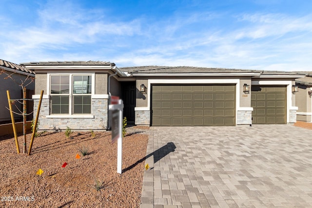 prairie-style home with a garage