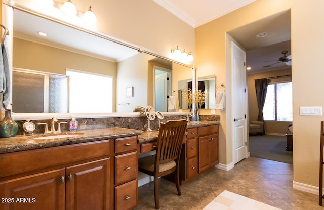 bathroom with ceiling fan, ornamental molding, vanity, and tile patterned flooring