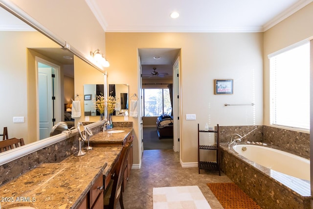 bathroom featuring a relaxing tiled tub, crown molding, and vanity