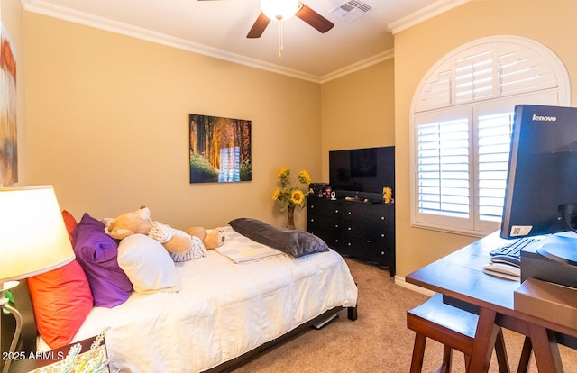 carpeted bedroom with ceiling fan and crown molding