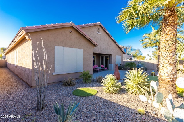 view of front of house with a patio area