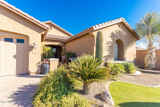 view of front of home featuring a garage