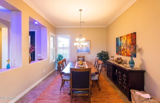 dining room featuring crown molding and a chandelier