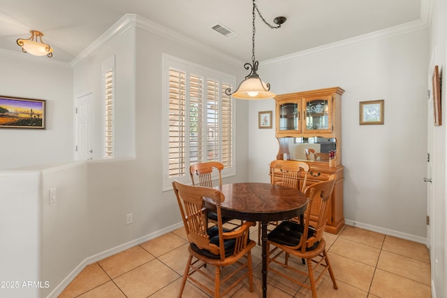 tiled dining area with ornamental molding