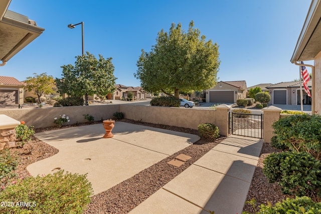 view of patio featuring a garage