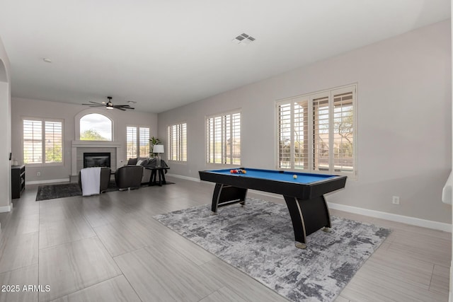 playroom featuring baseboards, visible vents, and a ceiling fan