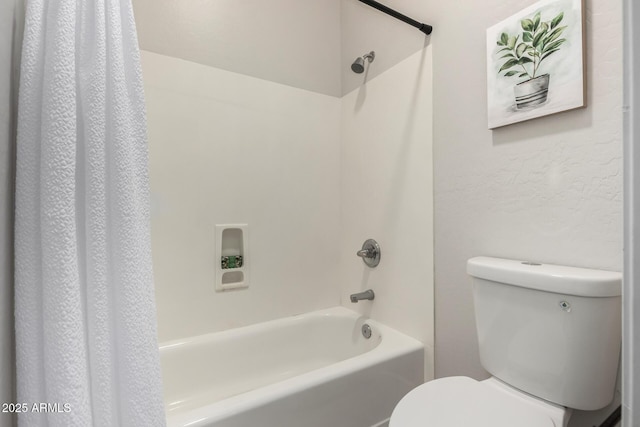 bathroom with toilet and shower / bathtub combination with curtain
