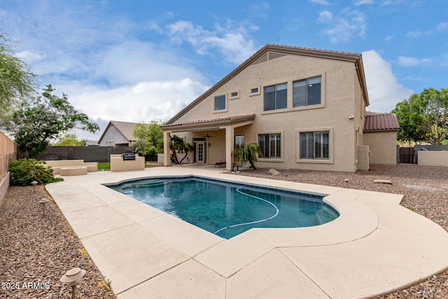 view of swimming pool with a patio, a fenced in pool, and a fenced backyard