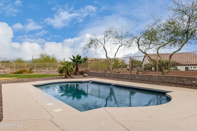 view of swimming pool featuring a fenced in pool and a fenced backyard