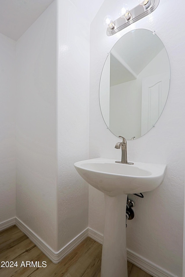 bathroom featuring hardwood / wood-style flooring