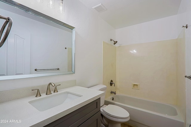 full bathroom featuring toilet, vanity, and tub / shower combination