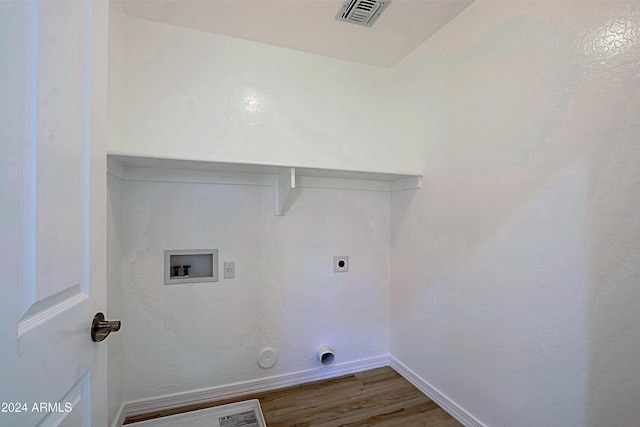 laundry area with hookup for an electric dryer, washer hookup, hardwood / wood-style flooring, and gas dryer hookup