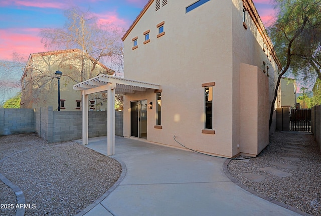 exterior space featuring a pergola and a patio area