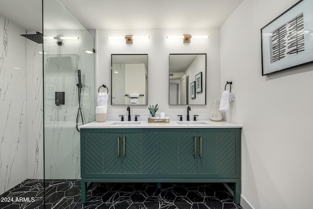 bathroom featuring vanity and tiled shower