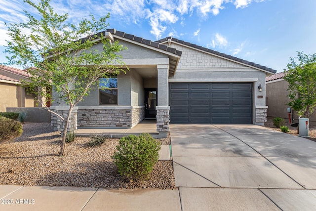 view of front of home featuring stucco siding, driveway, stone siding, and a garage