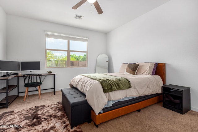 bedroom with carpet floors, baseboards, ceiling fan, and visible vents