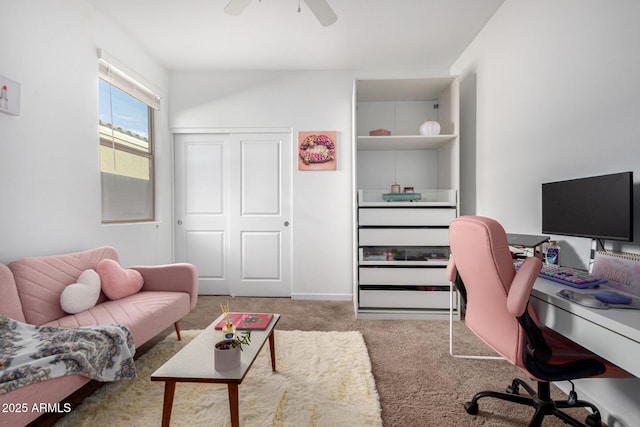 office space with carpet floors and ceiling fan