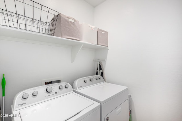 laundry room with laundry area and washing machine and dryer