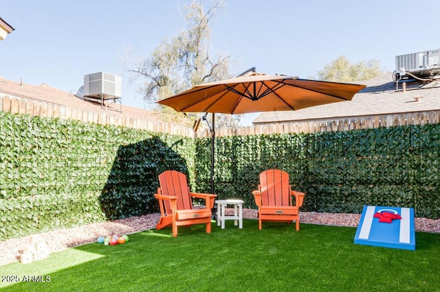 view of yard featuring central AC