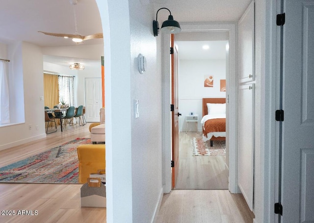 hallway featuring light hardwood / wood-style flooring