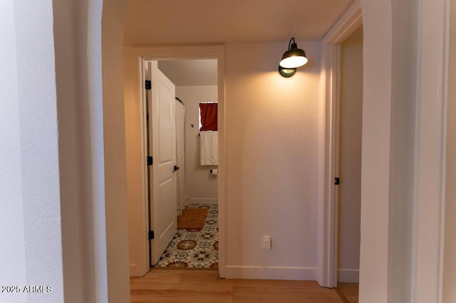 hallway featuring light hardwood / wood-style floors