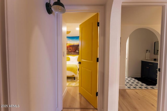 hallway featuring light wood-type flooring