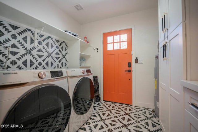 washroom with washer and clothes dryer