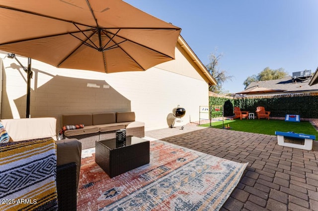 view of patio / terrace featuring a playground, central AC unit, and an outdoor living space