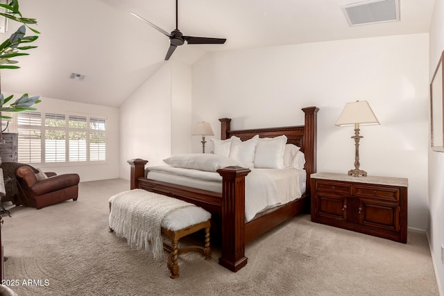 bedroom featuring ceiling fan, light carpet, and lofted ceiling