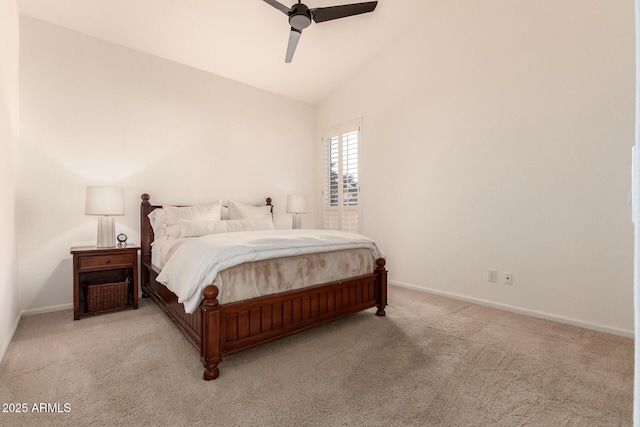 bedroom featuring ceiling fan, light carpet, and lofted ceiling