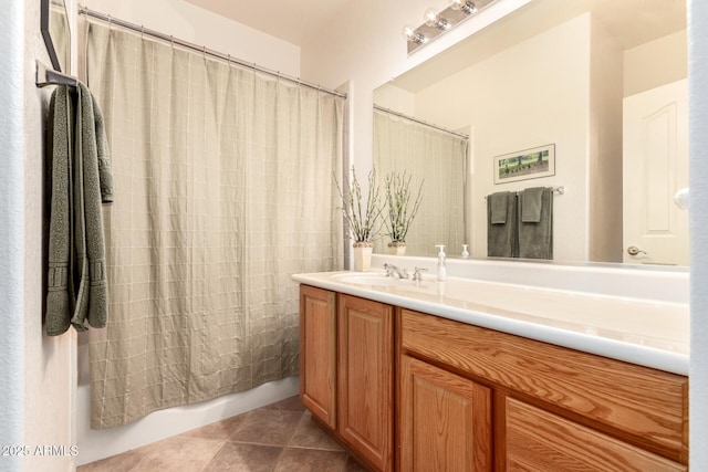 bathroom featuring tile patterned floors, vanity, and shower / bath combination with curtain