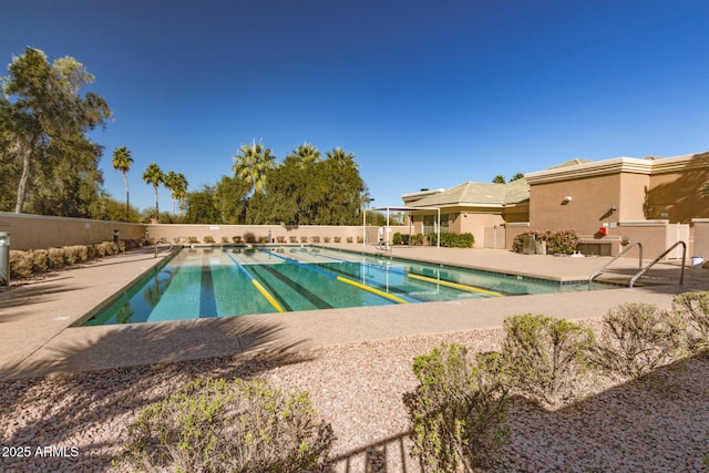 view of pool featuring a patio area