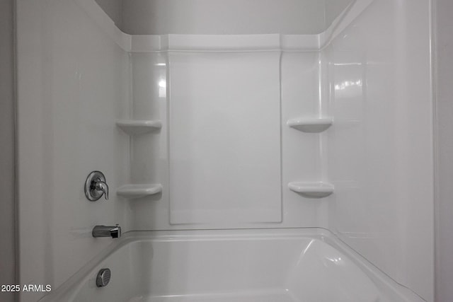 bathroom featuring walk in shower