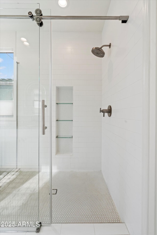 bathroom featuring a stall shower