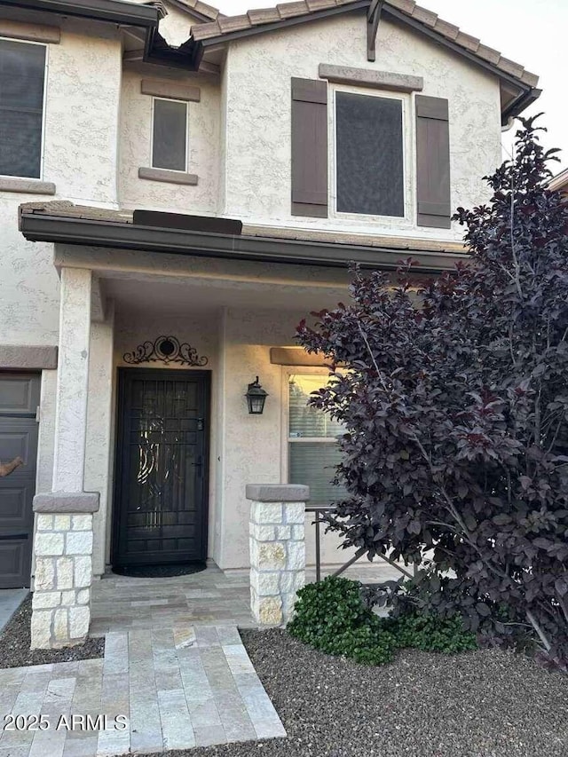28306 N 25th Dl, Phoenix, AZ 85085 - entrance to property with stucco siding and a porch