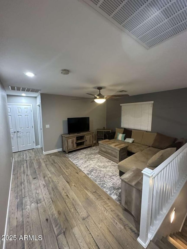 28306 N 25th Dl, Phoenix, AZ 85085 - living room with a ceiling fan, hardwood / wood-style flooring, and recessed lighting