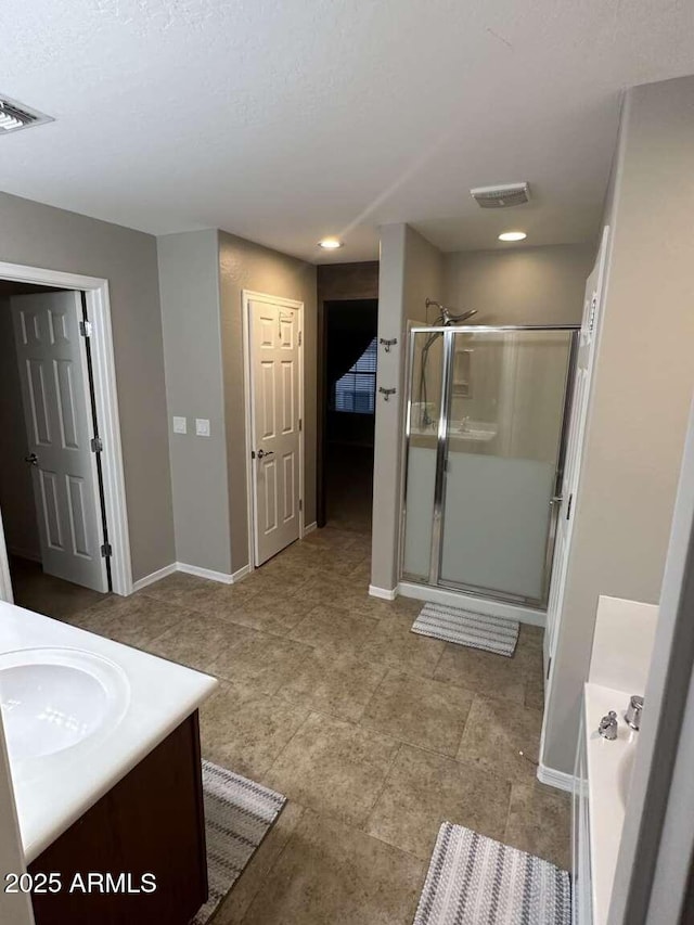 28306 N 25th Dl, Phoenix, AZ 85085 - bathroom featuring vanity, a stall shower, recessed lighting, and a tub