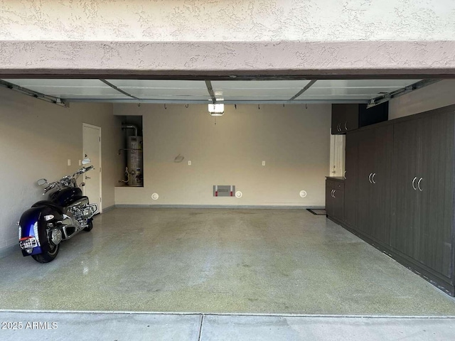 28306 N 25th Dl, Phoenix, AZ 85085 - garage featuring water heater and a garage door opener