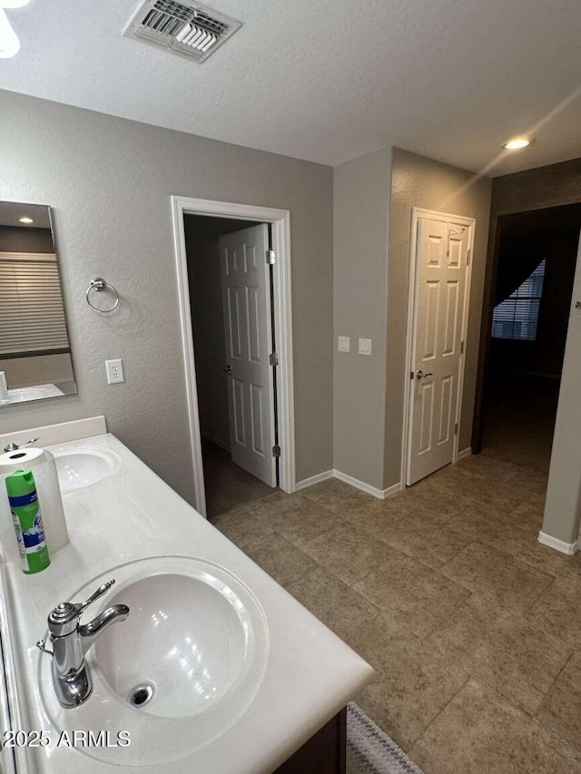 28306 N 25th Dl, Phoenix, AZ 85085 - bathroom featuring double vanity and recessed lighting
